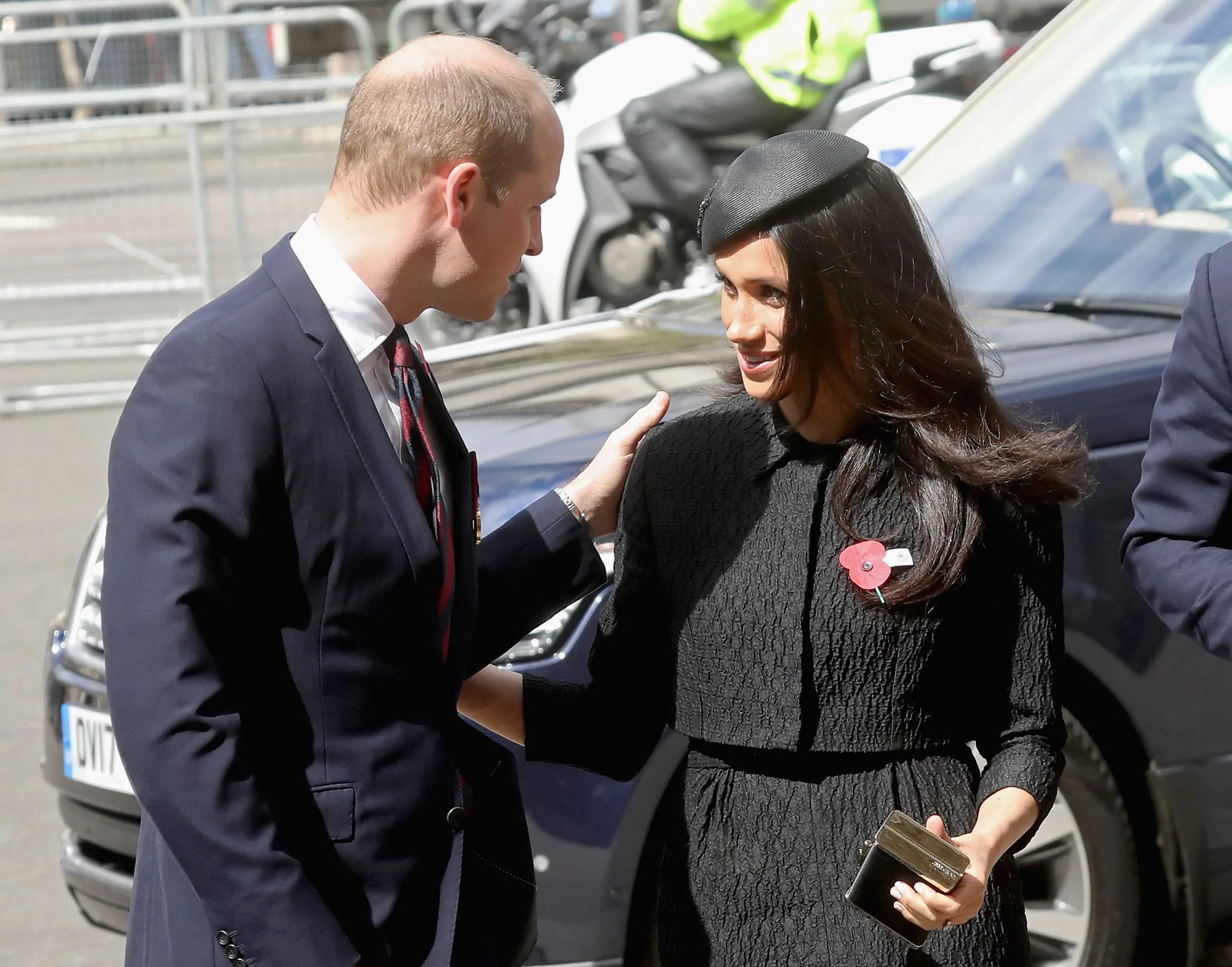 Meghan Markle speaks with Prince William